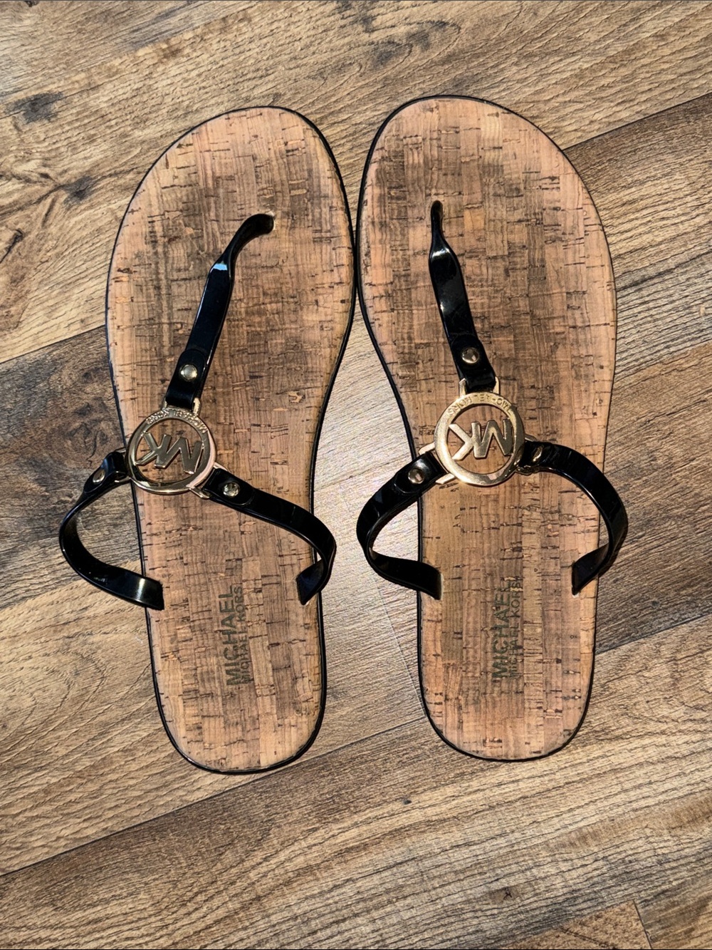 Michael Kors Black Patent Logo Thong Sandals with Gold Emblem